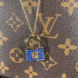 Gorgeous blue and gold Upcycled Louis Vuitton rhinestone charm on gold necklace